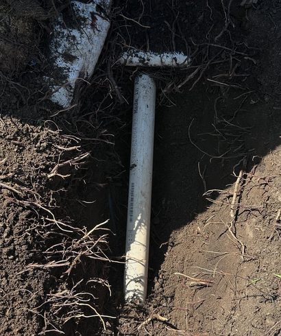 Lateral Line & Riser Replacement Behind a Retaining Wall