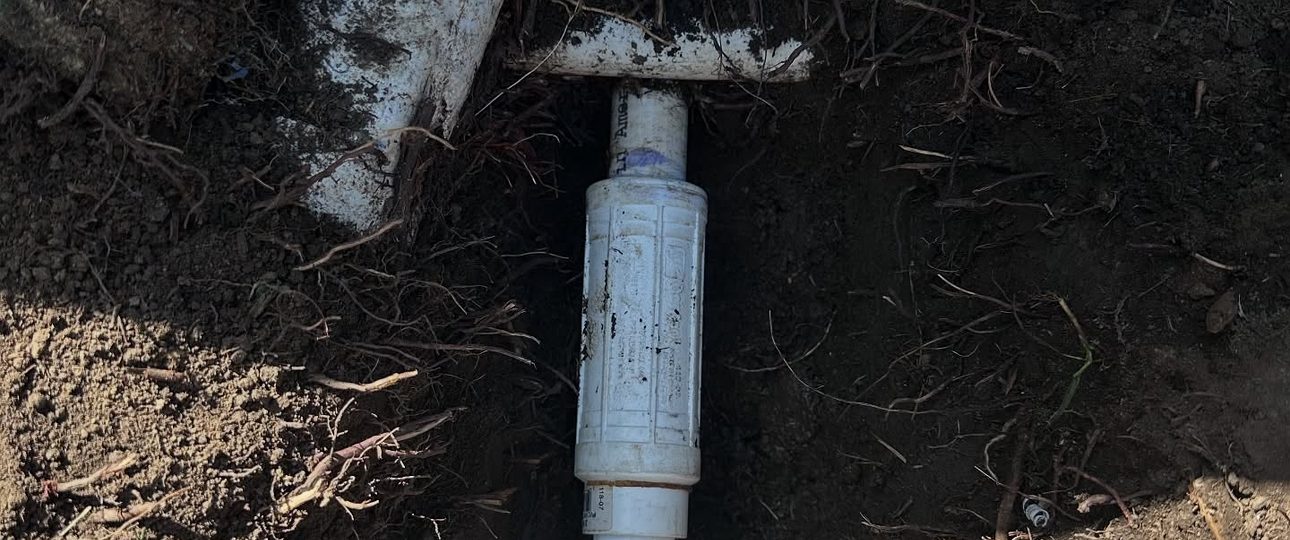 Lateral Line & Riser Replacement Behind a Retaining Wall
