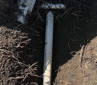 Lateral Line & Riser Replacement Behind a Retaining Wall