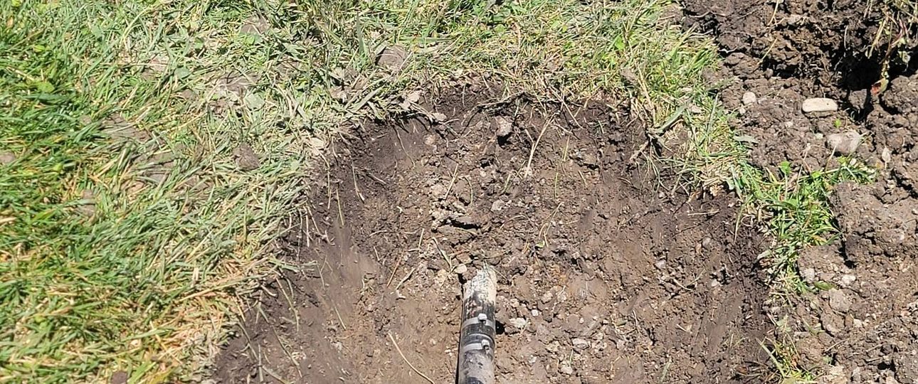 Zone Leak Repair Beside a City Sidewalk