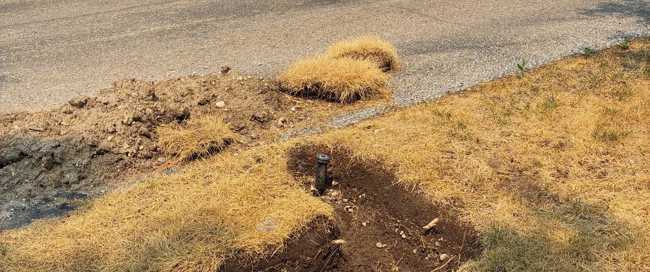 Irrigation Line Repair in Drought-Hardened Soil