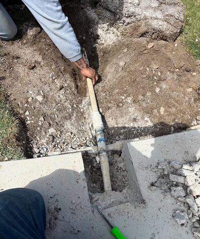 Boring a New Irrigation Line Under a Concrete Walkway